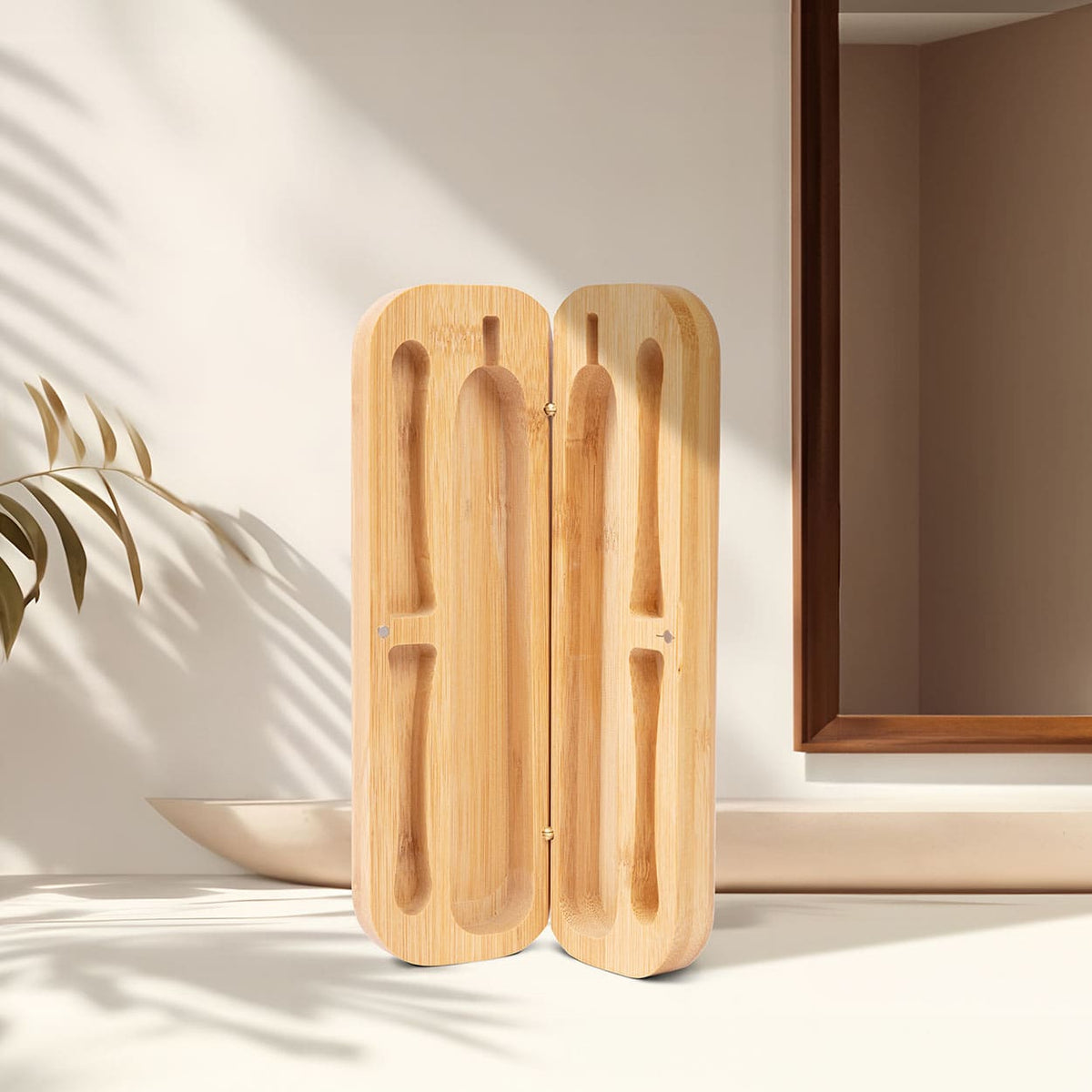 Bamboo Travel Case for Better & Better Bamboo Sonic Toothbrush. Zero plastic, made of natural bamboo. Case is open on a bathroom counter.